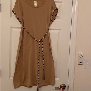 Polyester, just-below the knee dress. Worn ONCE!